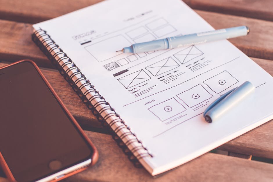 Web designer collaborating with a developer on website mockups in a Toronto agency office