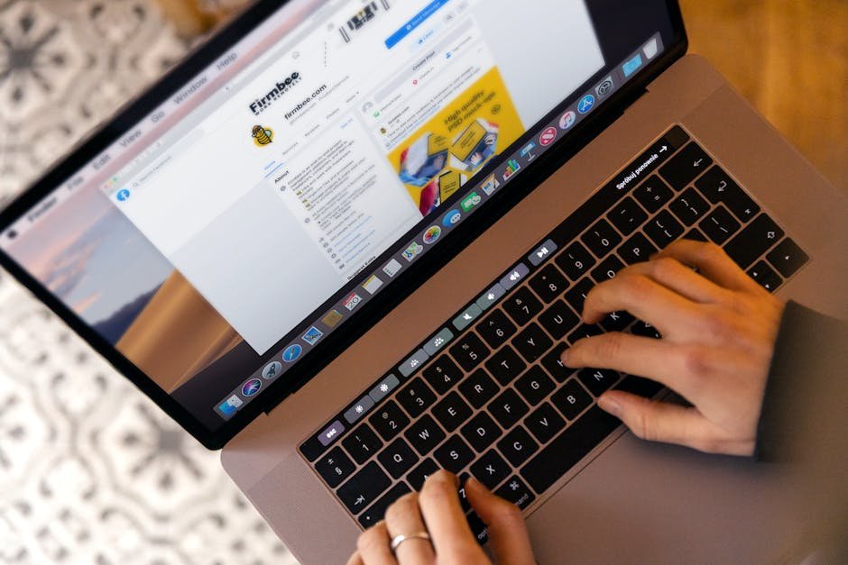 Email marketing campaign being drafted on a laptop with analytics open