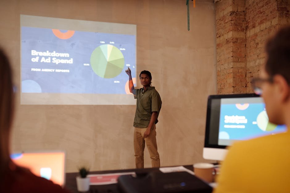 Team reviewing video ad creative on a monitor