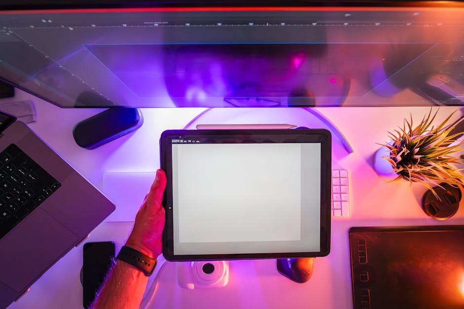 UX designer sketching user interface wireframes on a tablet