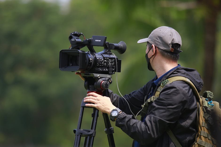 Creator filming platform-native vertical video on iPhone rig