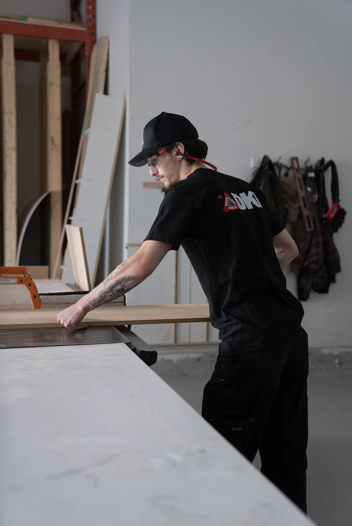 DKI restoration technician on site in branded DKI workwear